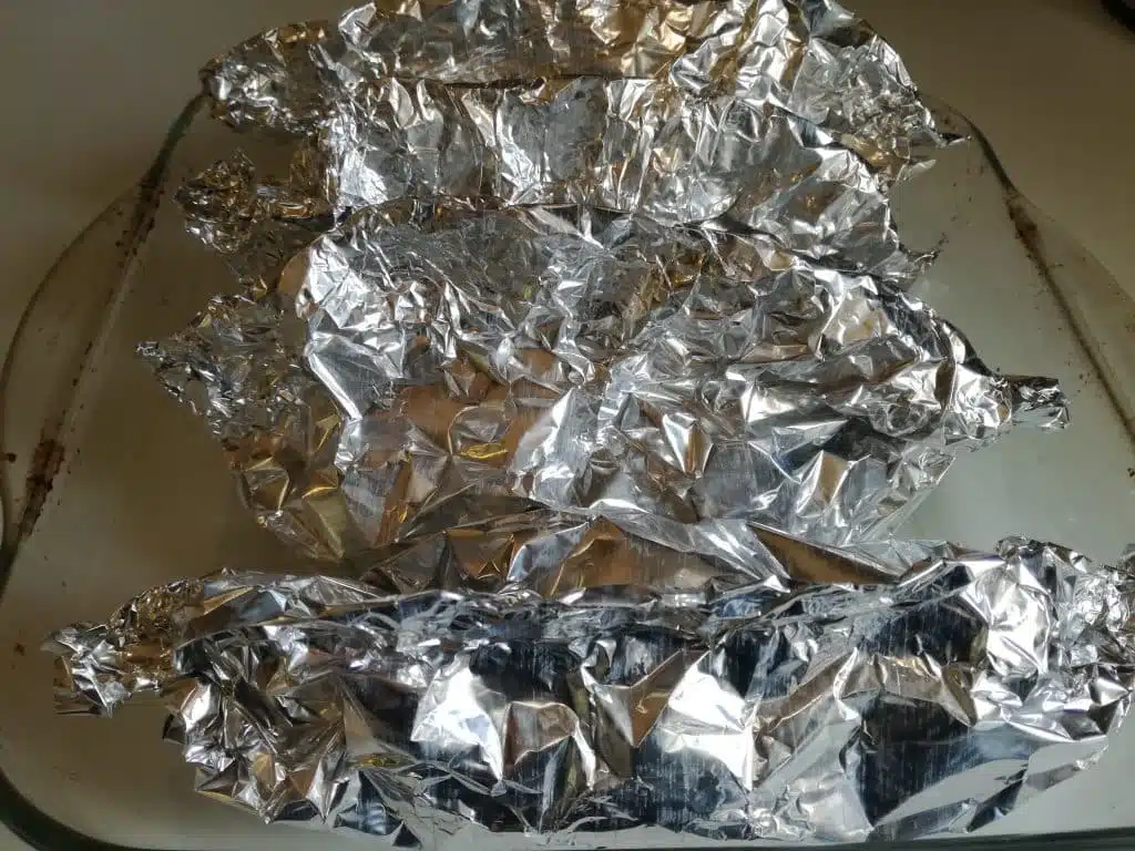 Papillote de colin et sa julienne de légumes : cuisson des papillotes